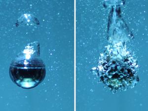 A 2-centimetre heated steel sphere cooling in boiling water. In the left image the sphere is in the film-boiling or Leidenfrost regime, wrapped in a vapour layer. In the right image the sphere temperature has fallen and the cooling is switched to nucleate boiling regime (Image: Ivan Vakarelski)
