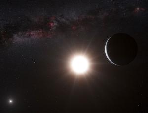 A different sun: imagining what you might see if you were in the Alpha Centauri B system, with our sun shining dimly in the distance and the central star beyond a crescent of the planet we have already discovered (Image: ESA)