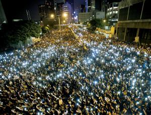 Phones aloft for democracy (Image: AFP/Getty/Xaume Olleros)